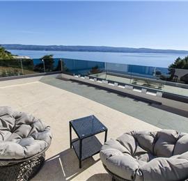 5 bedroom beachfront villa with heated pool near Omis, sleeps 9